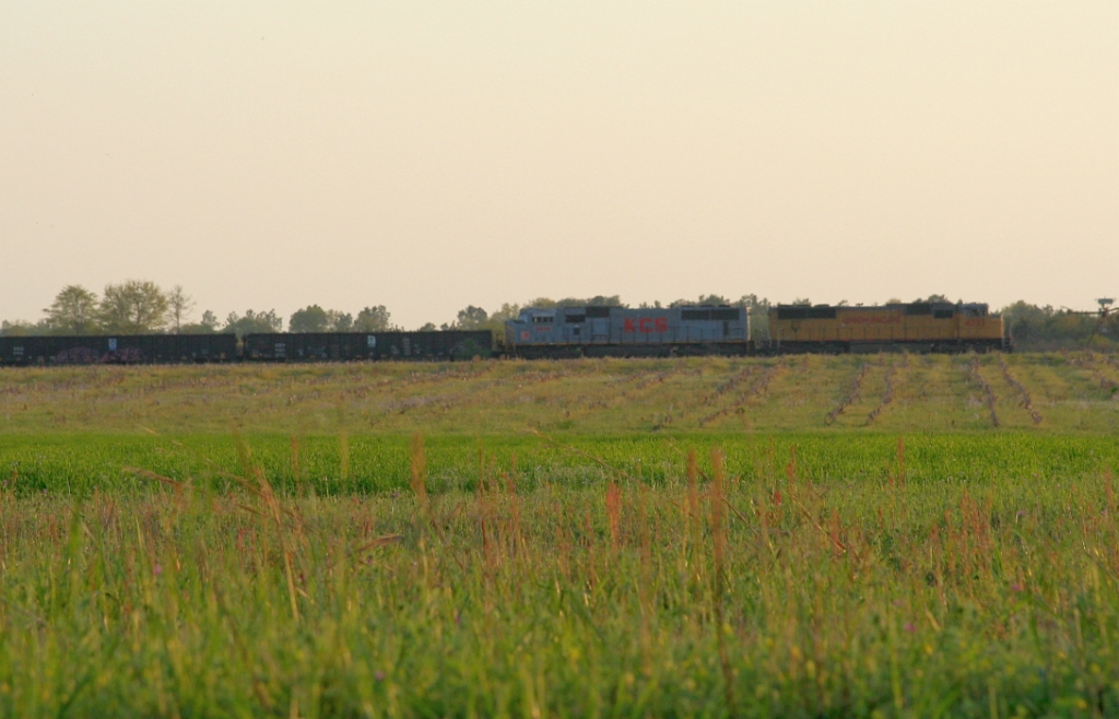 NB freight with UP/KCS power on the law